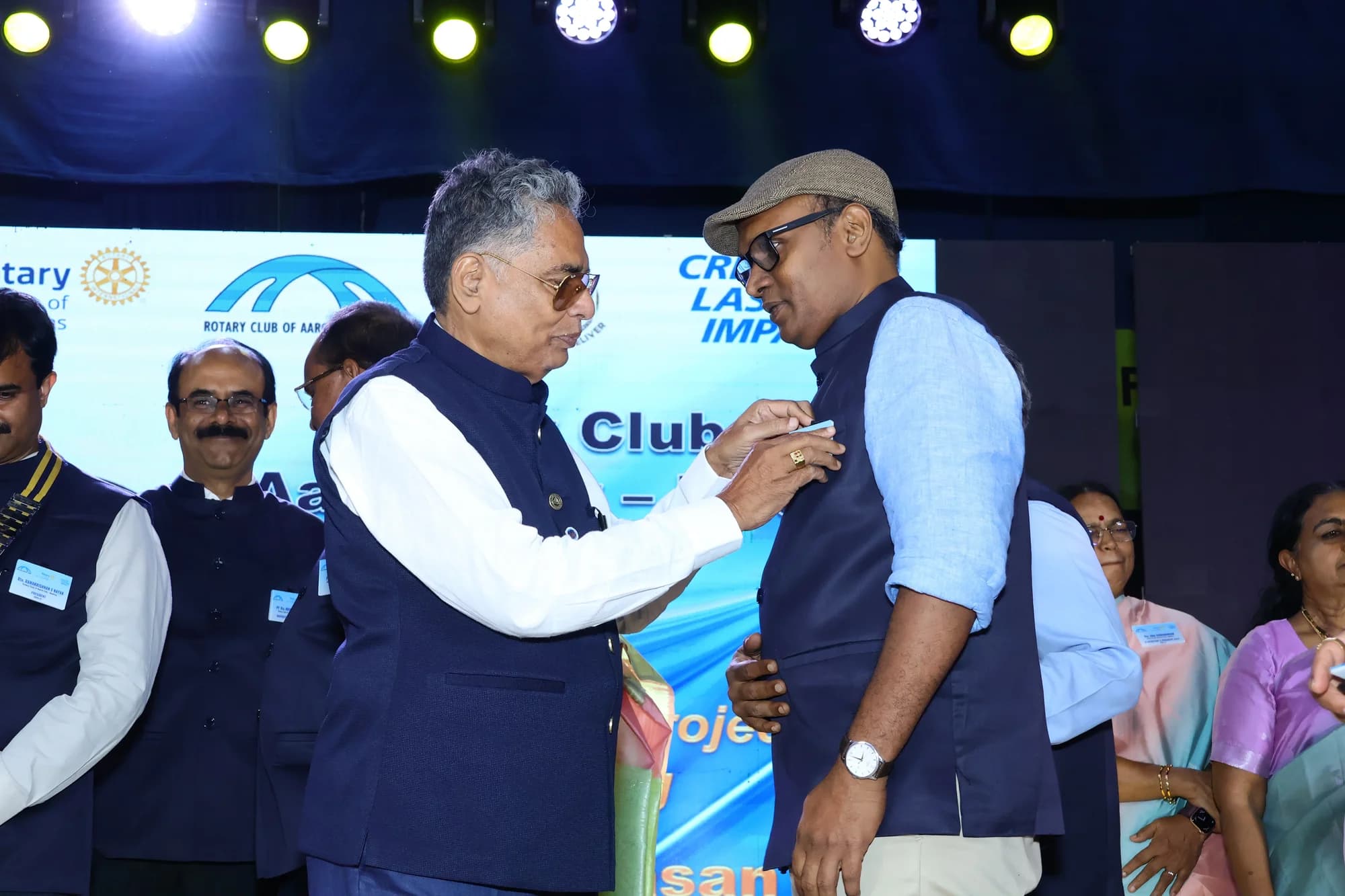 Suresh Ramakrishnan being honoured at a Rotary Club event